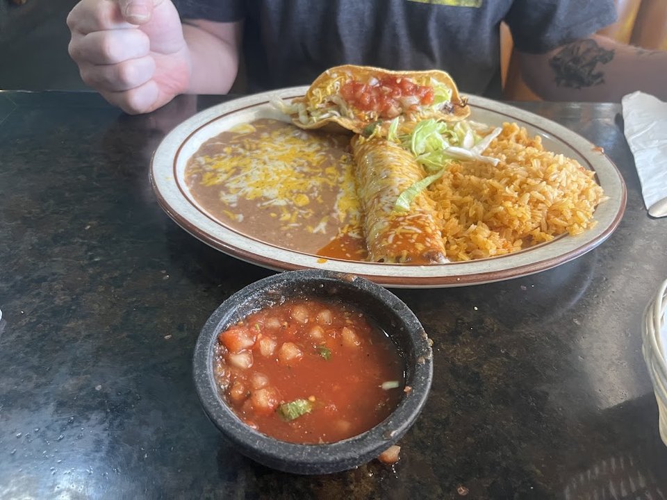 Menu items with Mexican and seafood dishes.