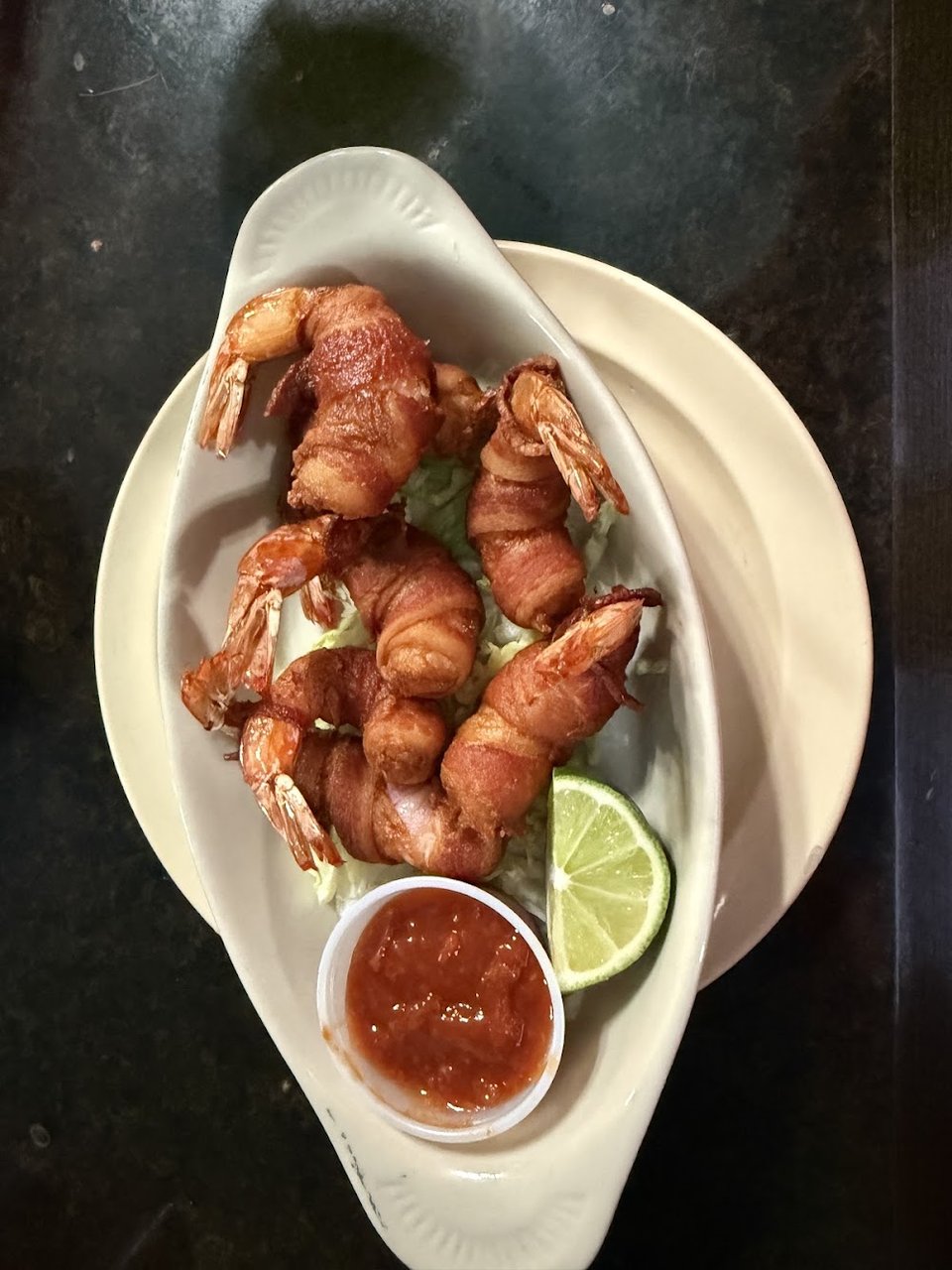 Menu items with Mexican and seafood dishes.